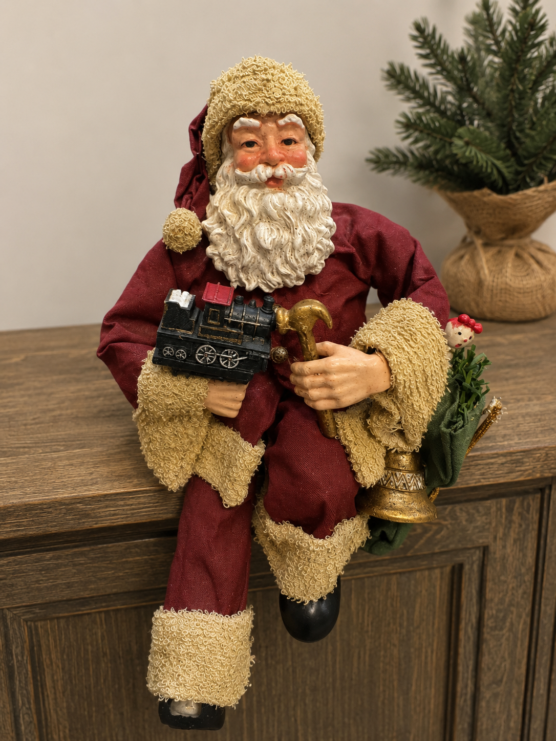 Vintage-Style Sitting Santa Claus Shelf Sitter with Toy Train, Bell & Gift Sack