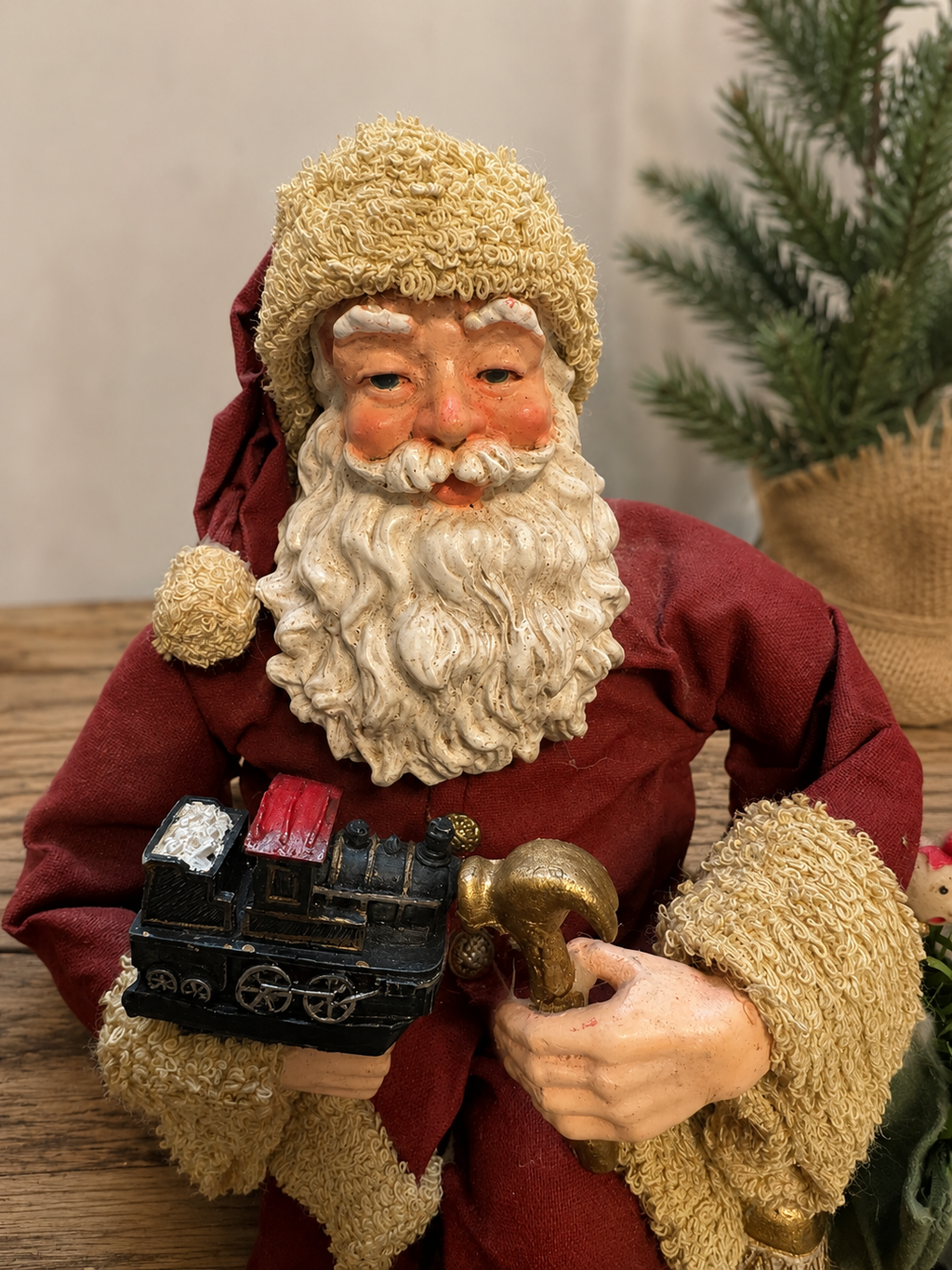 Vintage-Style Sitting Santa Claus Shelf Sitter with Toy Train, Bell & Gift Sack