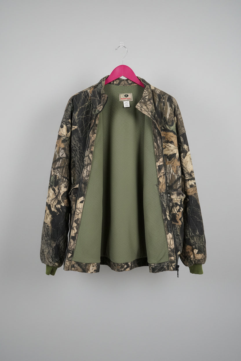 Original photo of front of vintage Mossy Oak camouflage bomber jacket on hanger