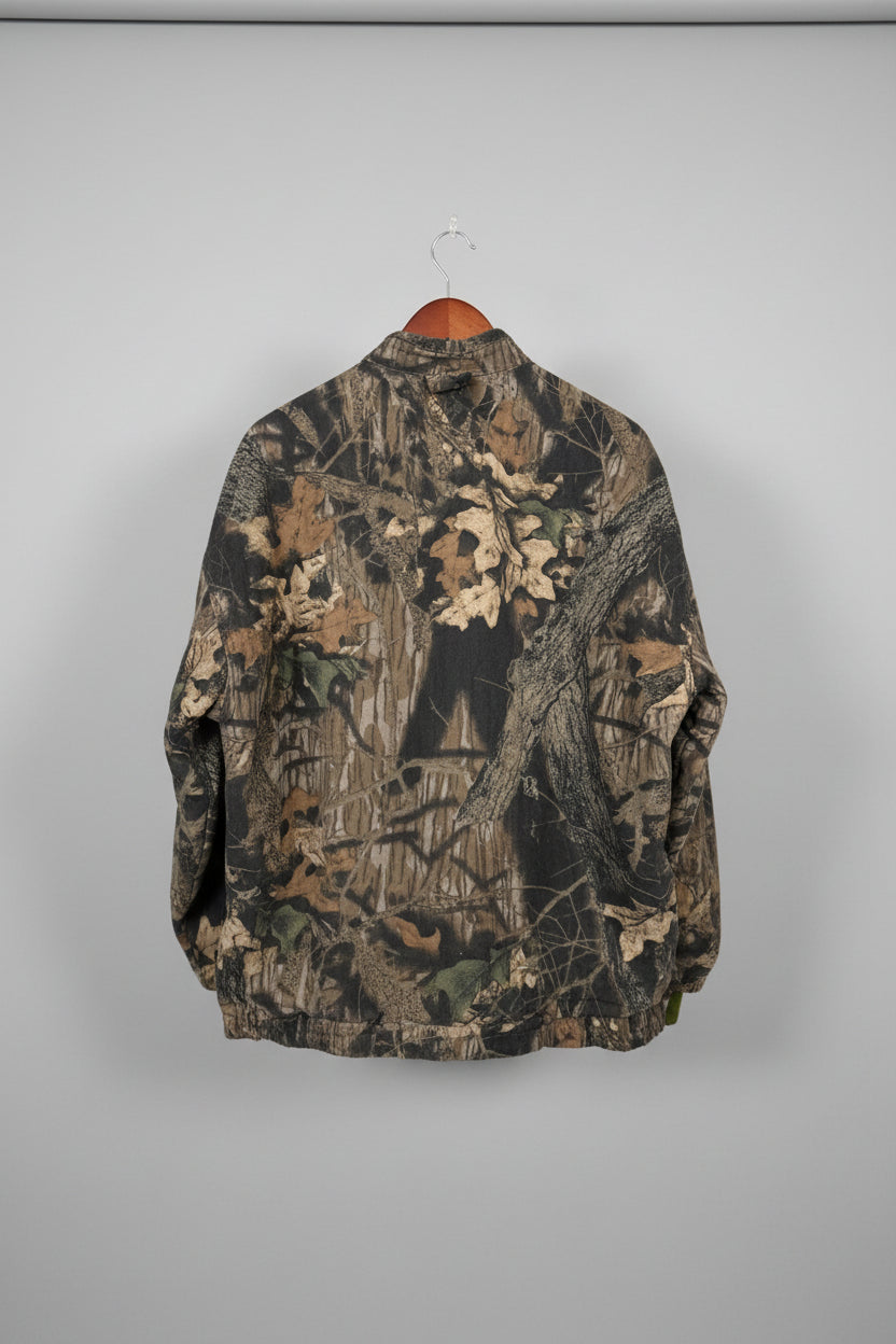 Original photo of back of vintage Mossy Oak camouflage bomber jacket