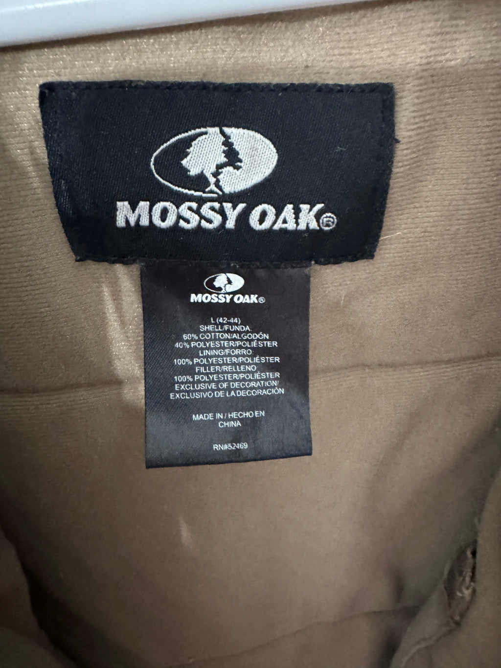 Original Mossy Oak interior garment tag and material composition