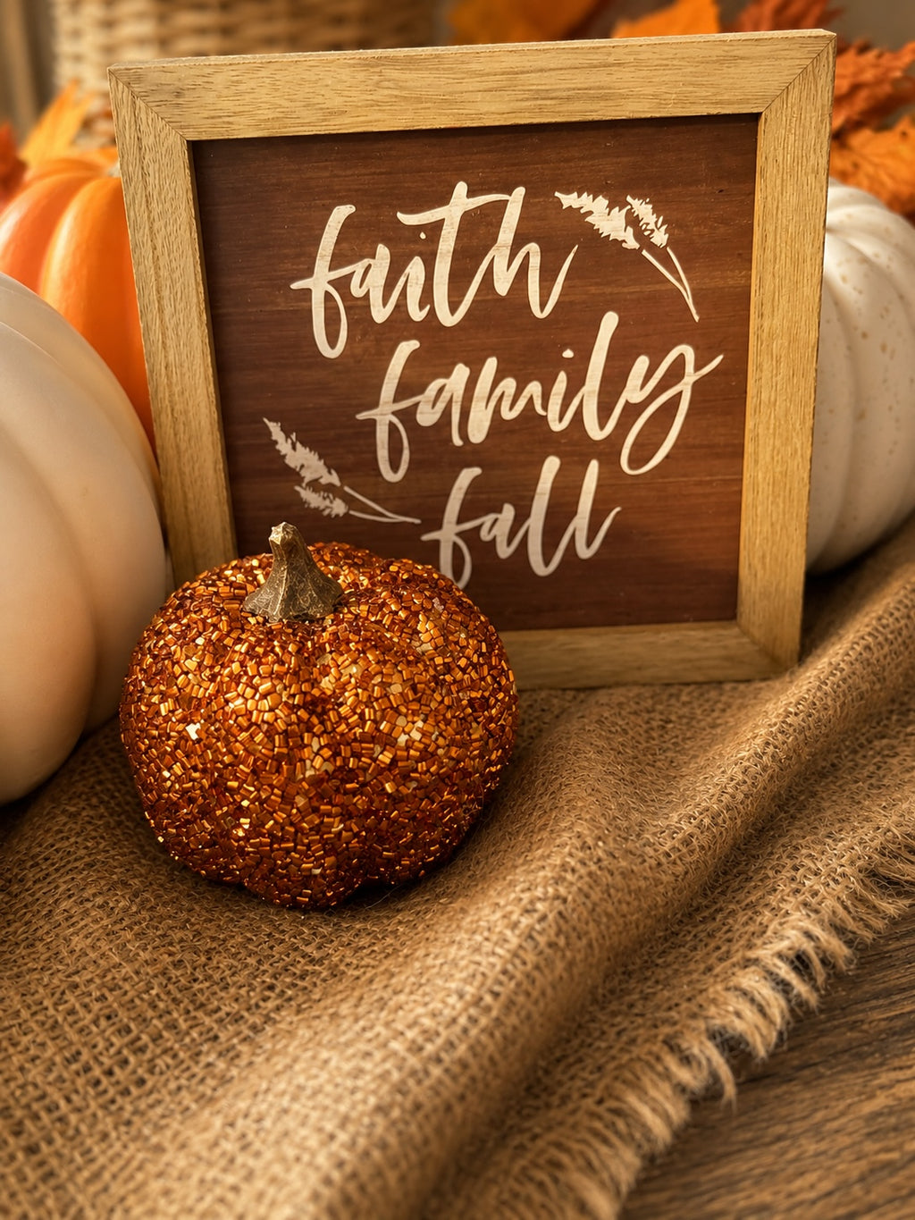 The Flip Side autumn tabletop set with a wooden sign reading faith family fall, white pumpkins, and a beaded pumpkin.