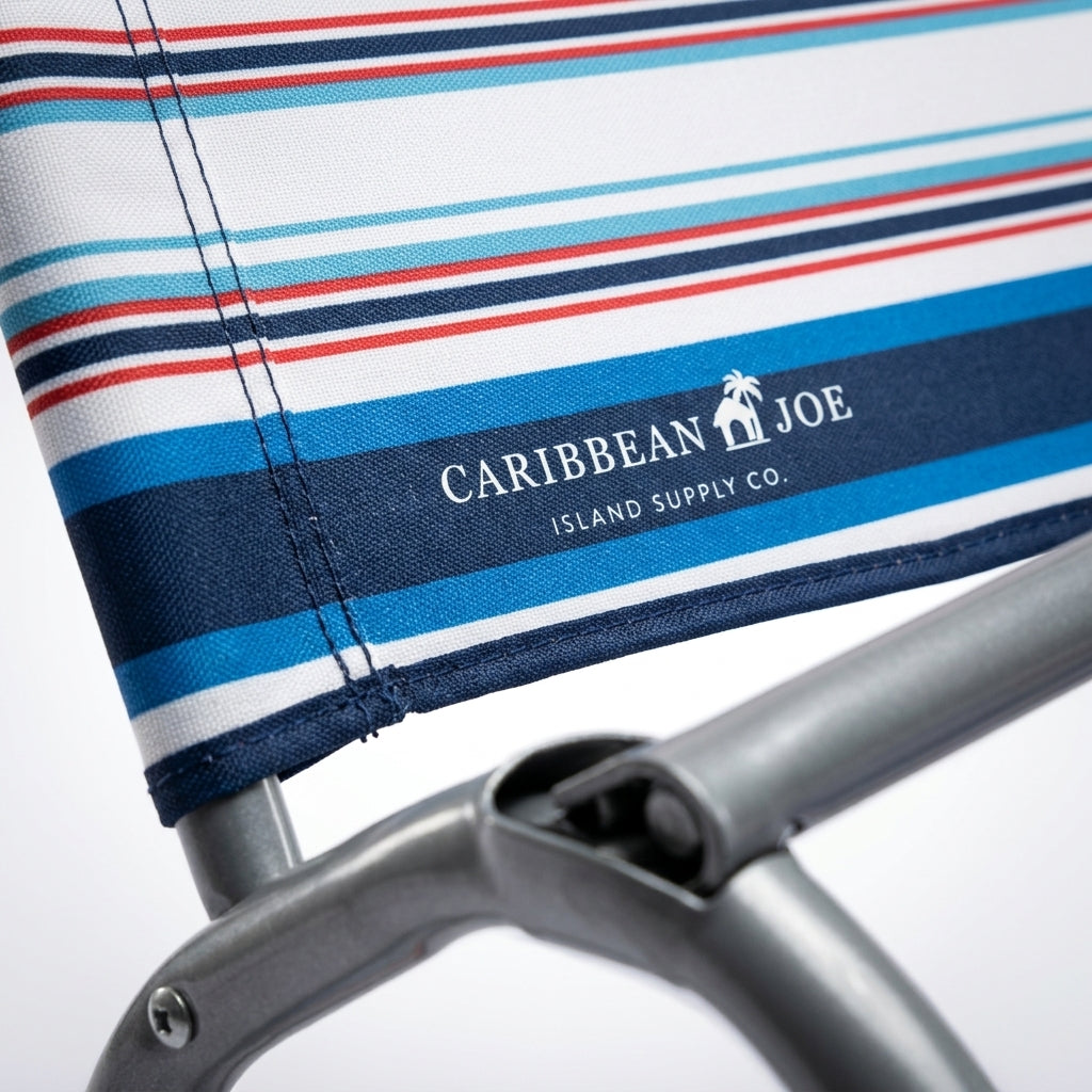 Close-up detail of Caribbean Joe branding and striped fabric stitching