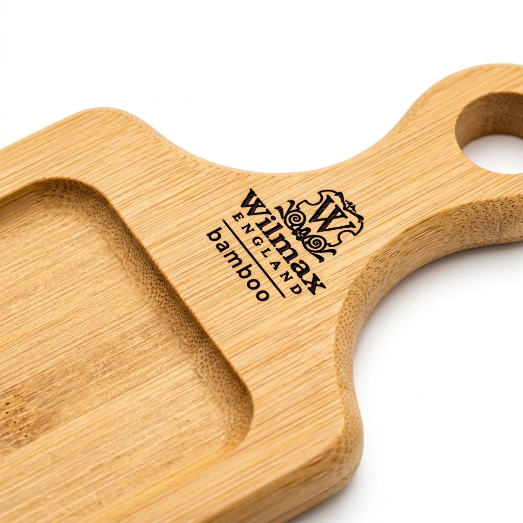 Close-up detail of natural bamboo grain and Wilmax England etched handle logo
