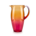 Vibrant gradient ombre beverage pitcher on pure white studio background